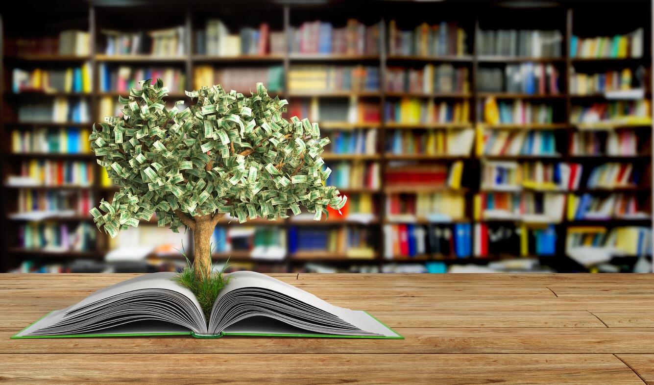 Tree growing from a book