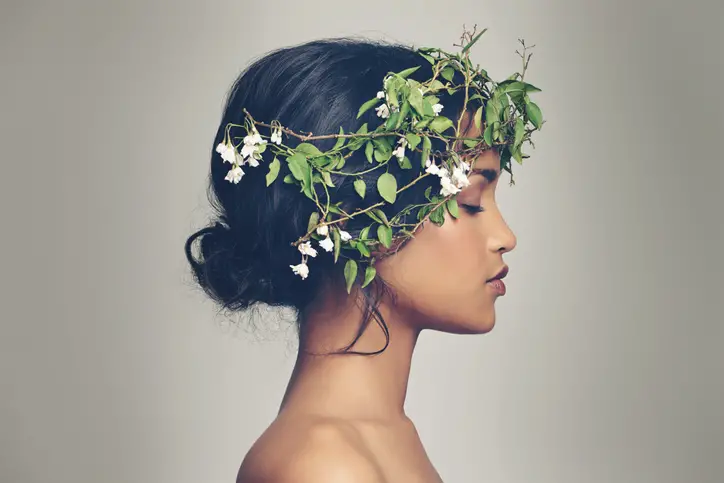 Woman with a hairband made from plants