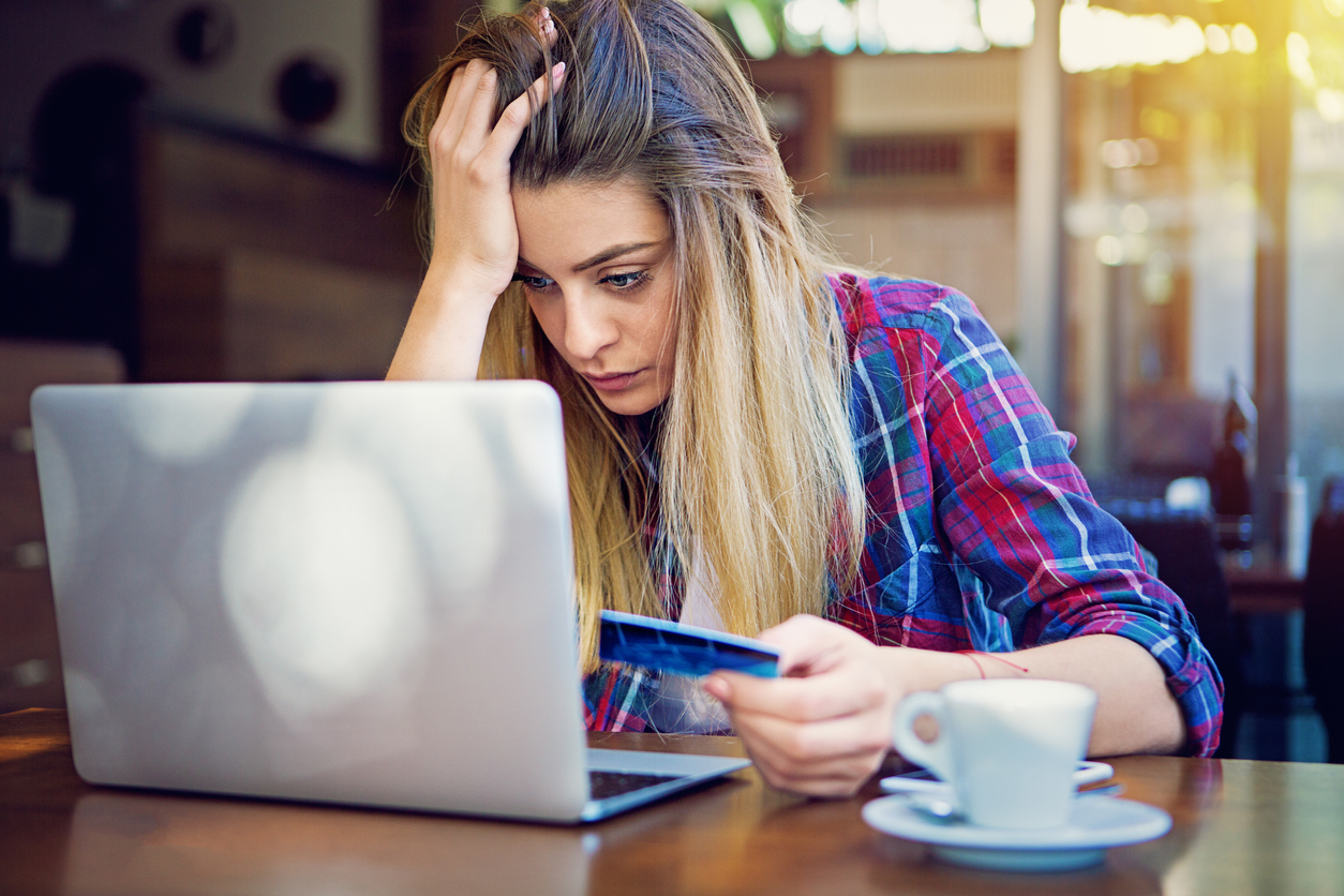 Woman dealing with bad Wi-Fi.