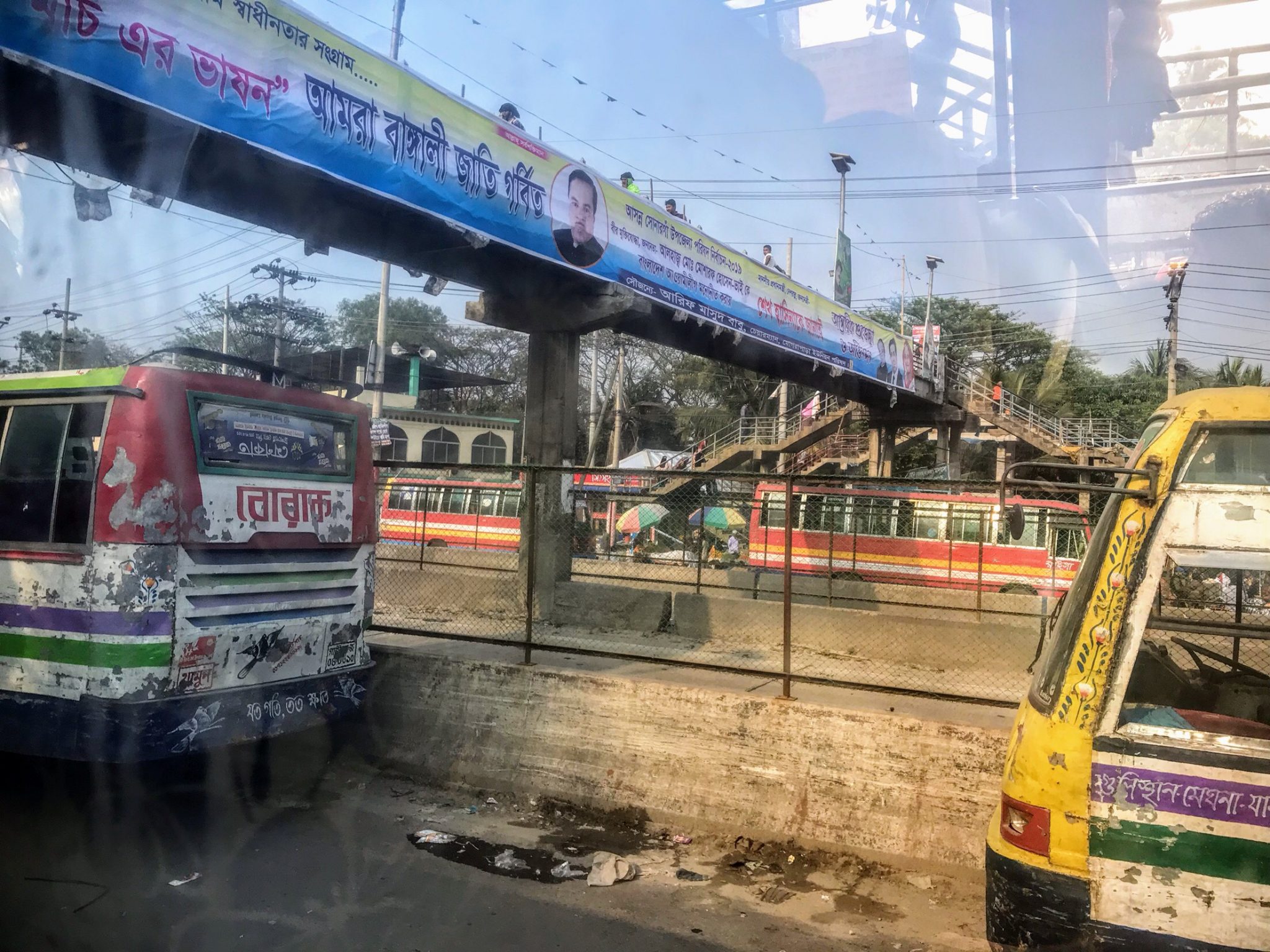 Mograpara bus stop for Dhaka, Bangladesh 