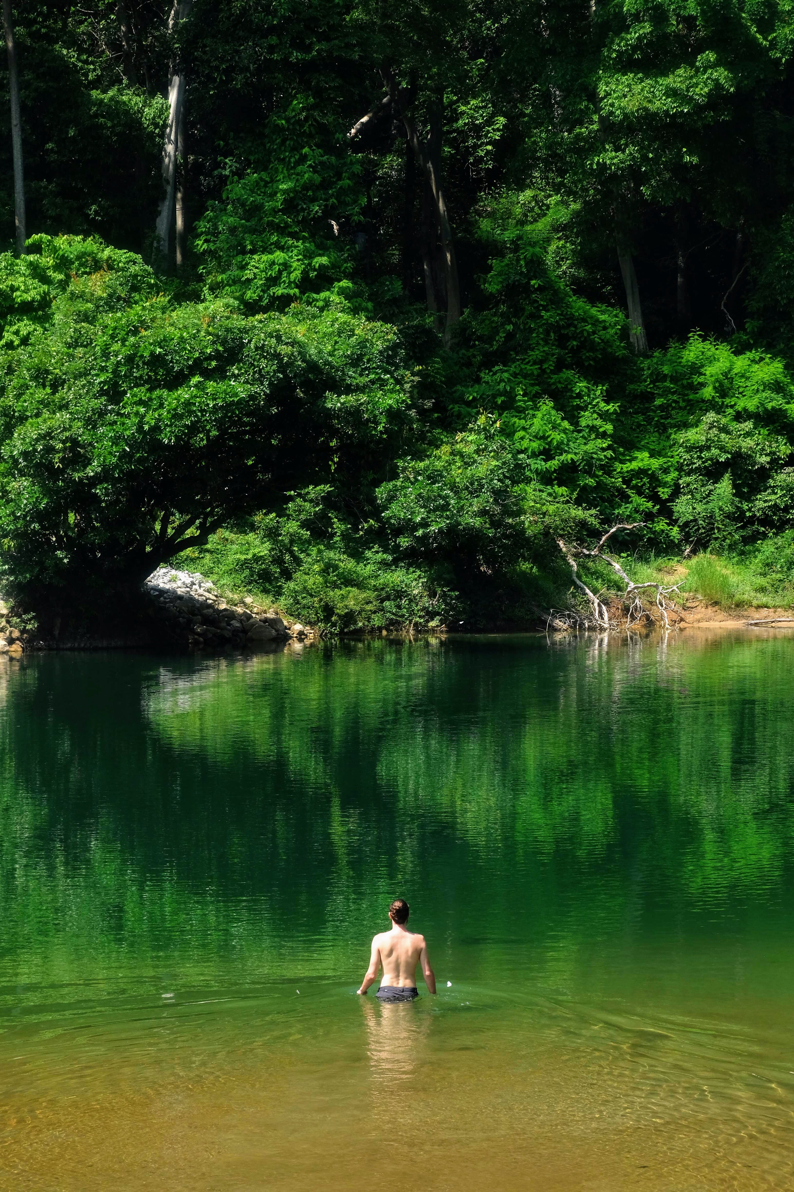 Swimming in the Nam Hin Bun River, Laos 