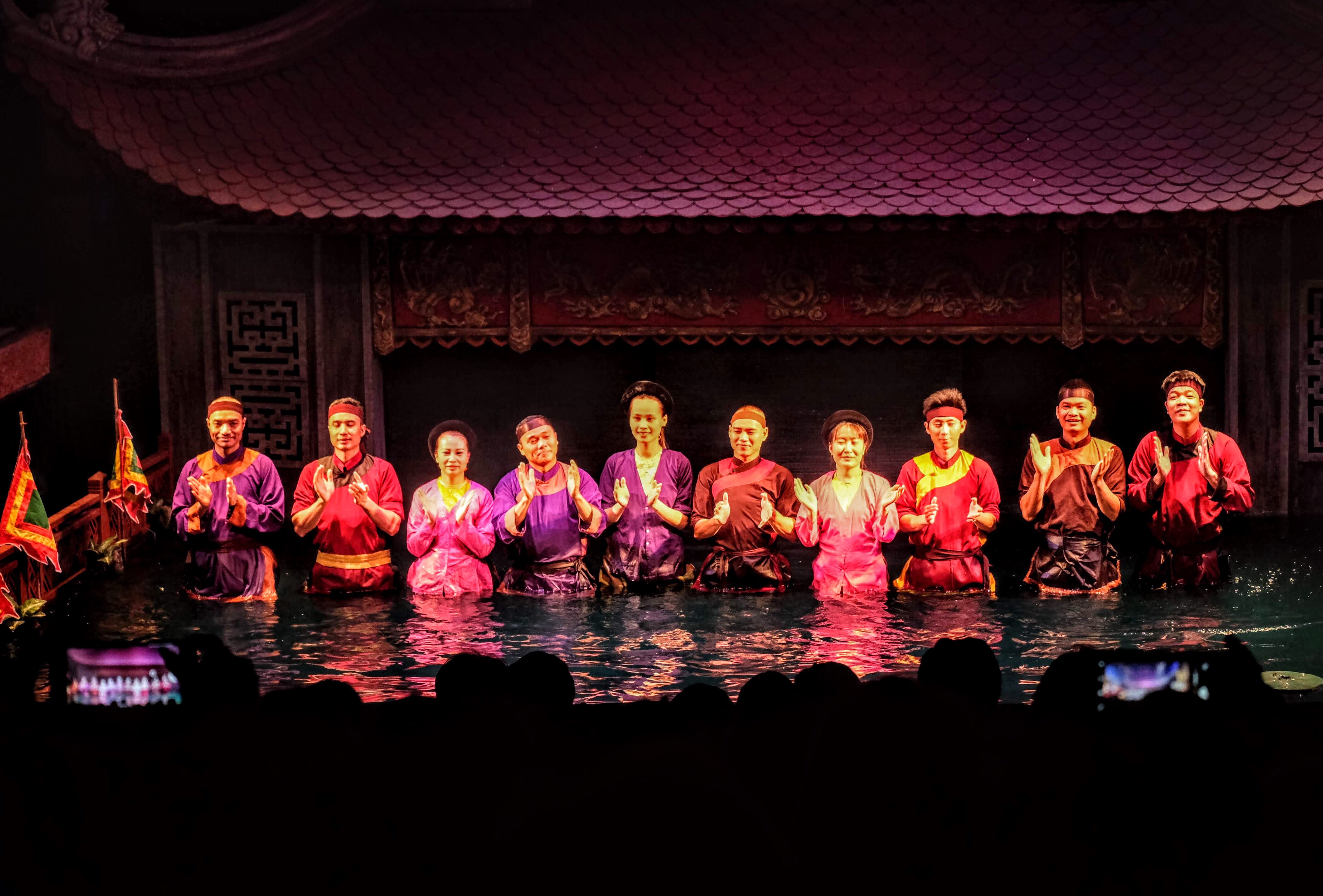 Puppeteers at the water puppet theatre, Hanoi, Vietnam