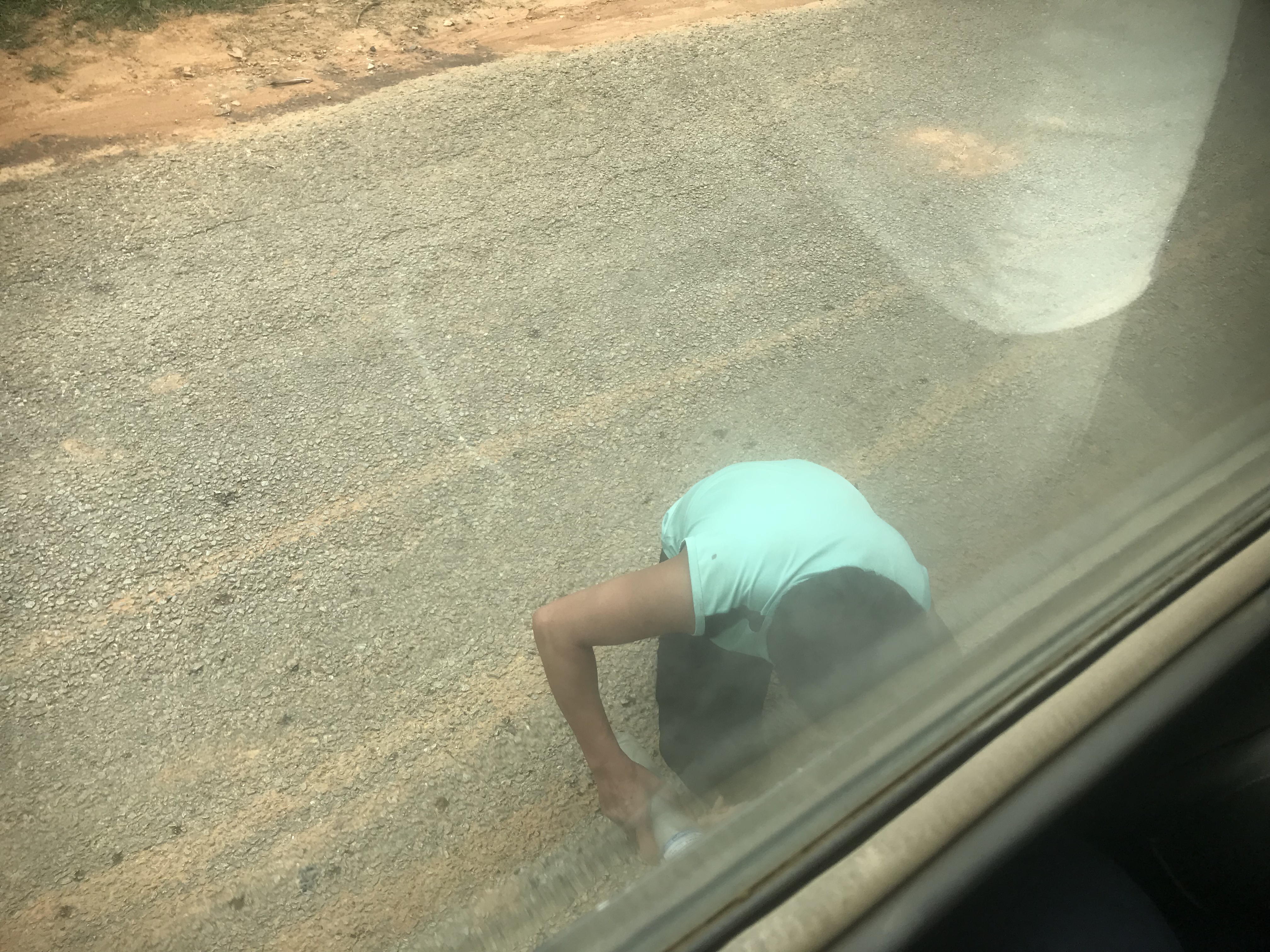 Cooling down the brakes on the bus, Laos