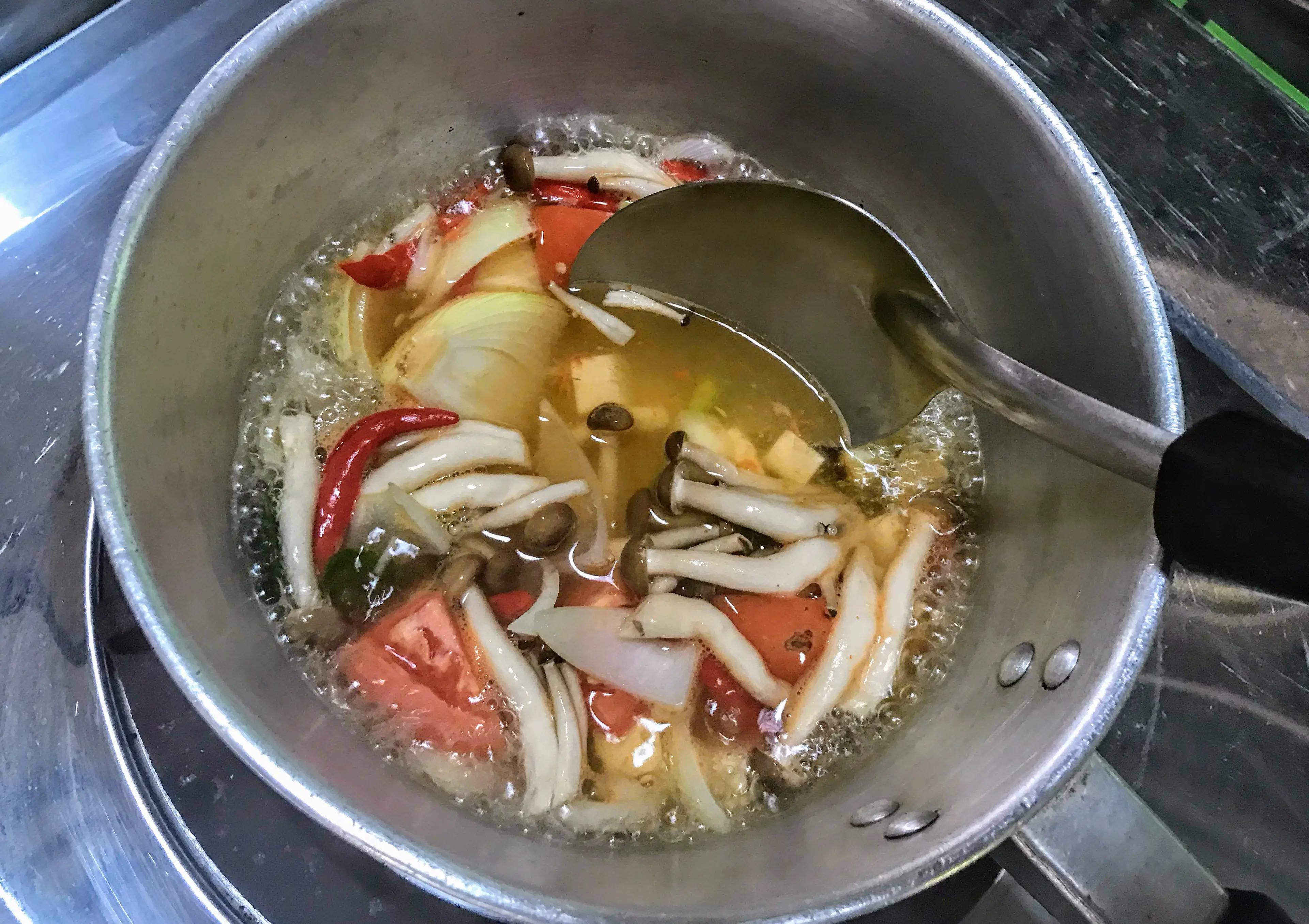 Making hot and sour soup, Koh Chang, Thailand 