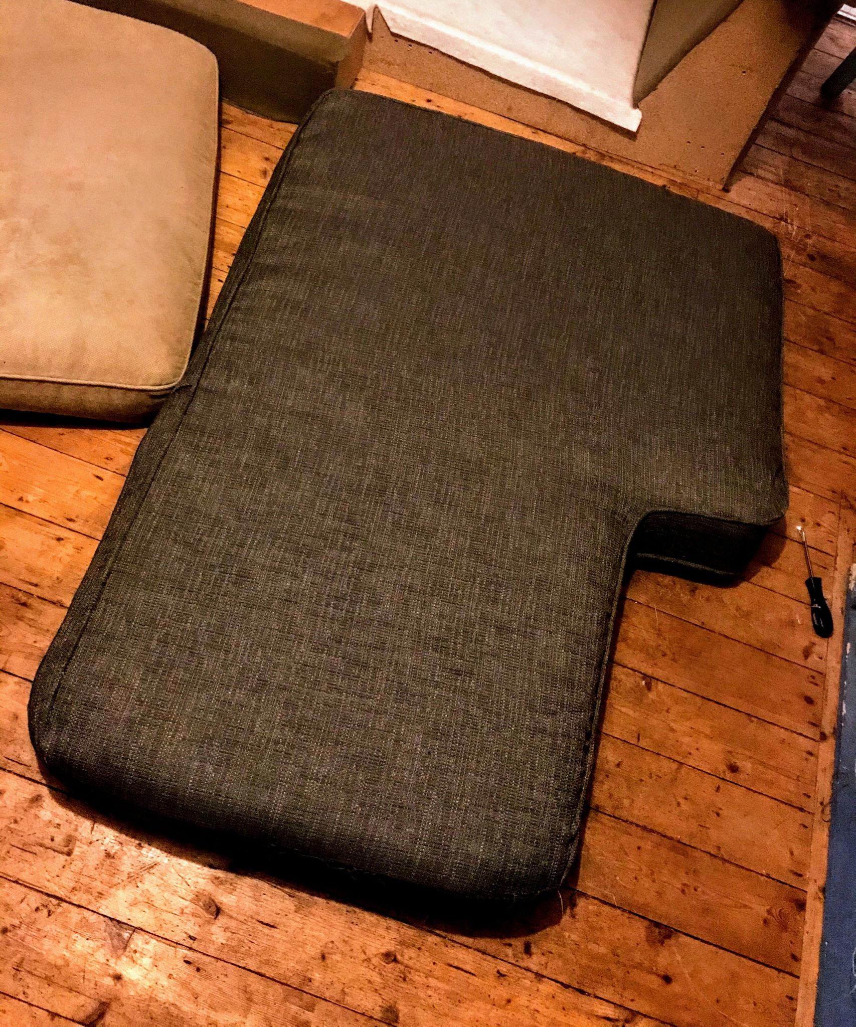 Large piped sofa cushion