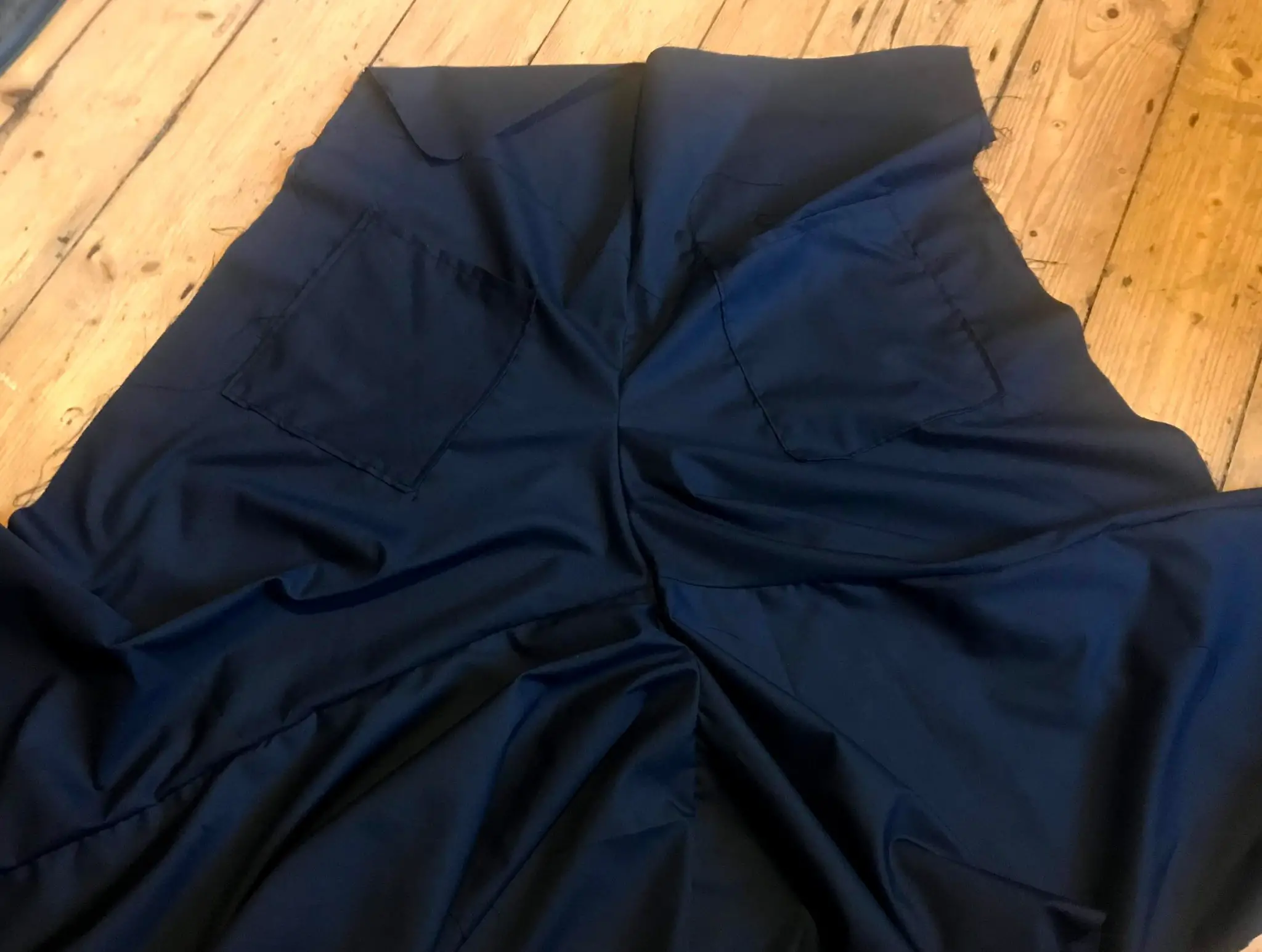 Trousers sewn at the crotch