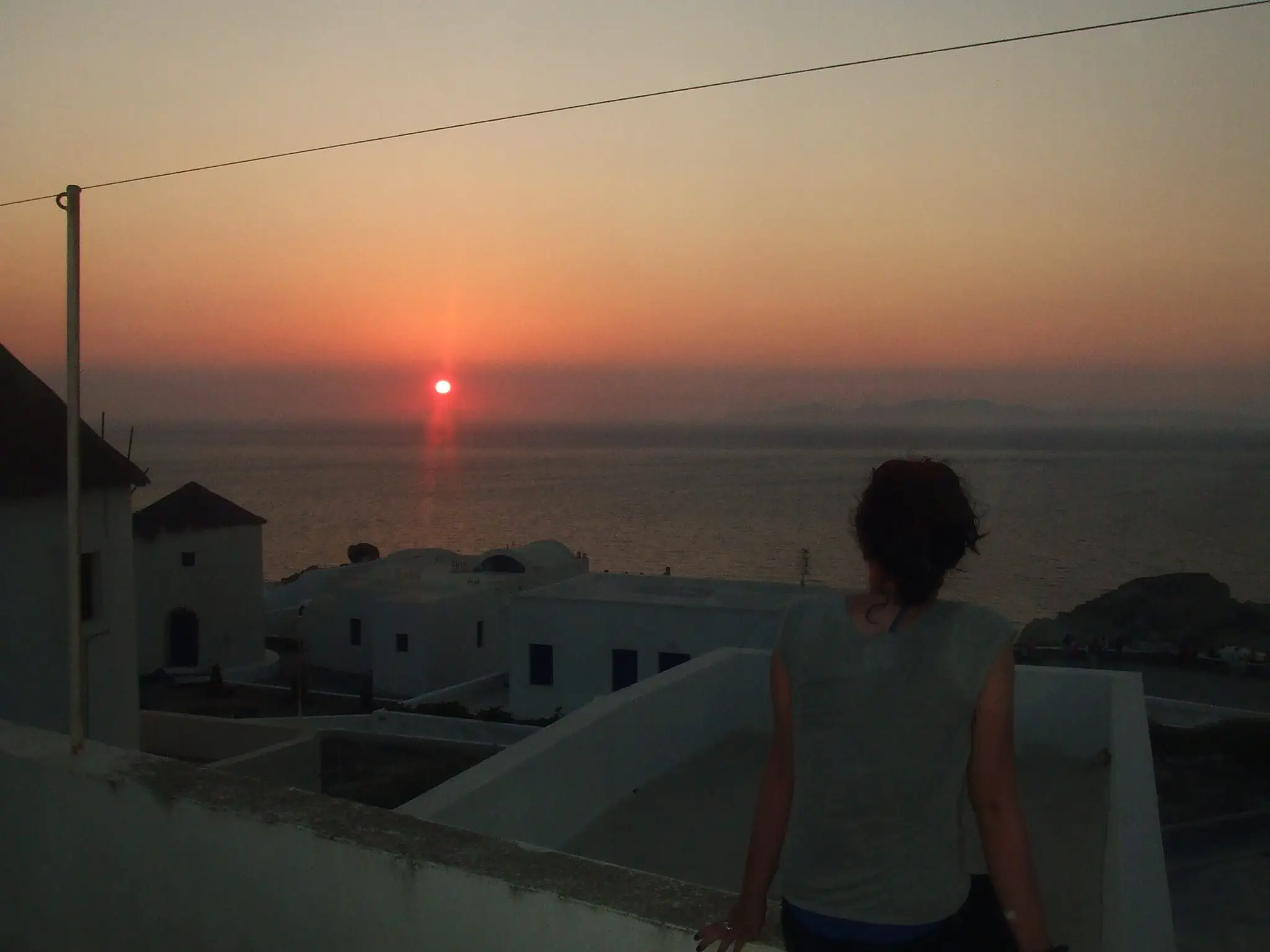Watching Santorini’s famous sunset in Oia