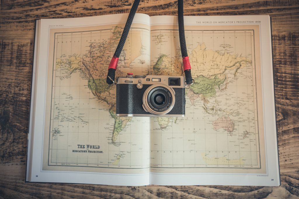 Camera and vintage map. Photo by Chris Lawton on Unsplash