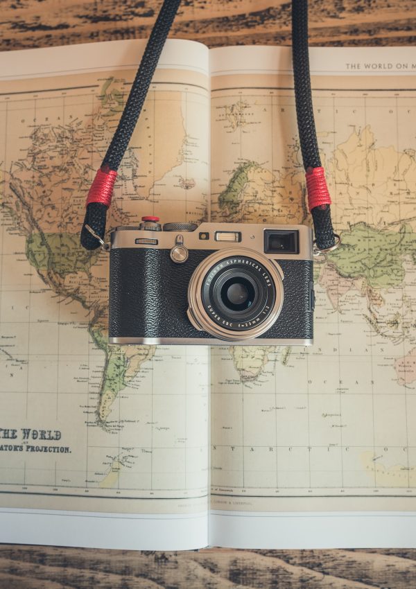 Camera and vintage map. Photo by Chris Lawton on Unsplash